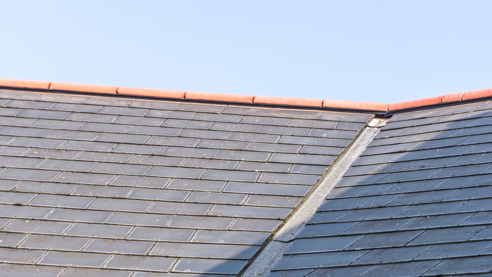 Slate roof ridge line and lead valley detail